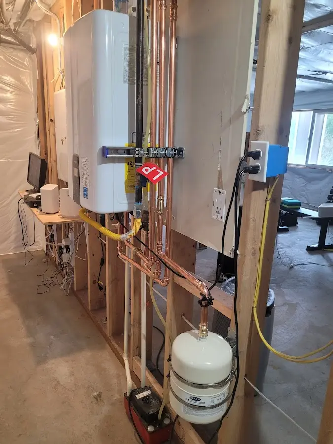 Licensed plumber repairing a kitchen sink in Denver