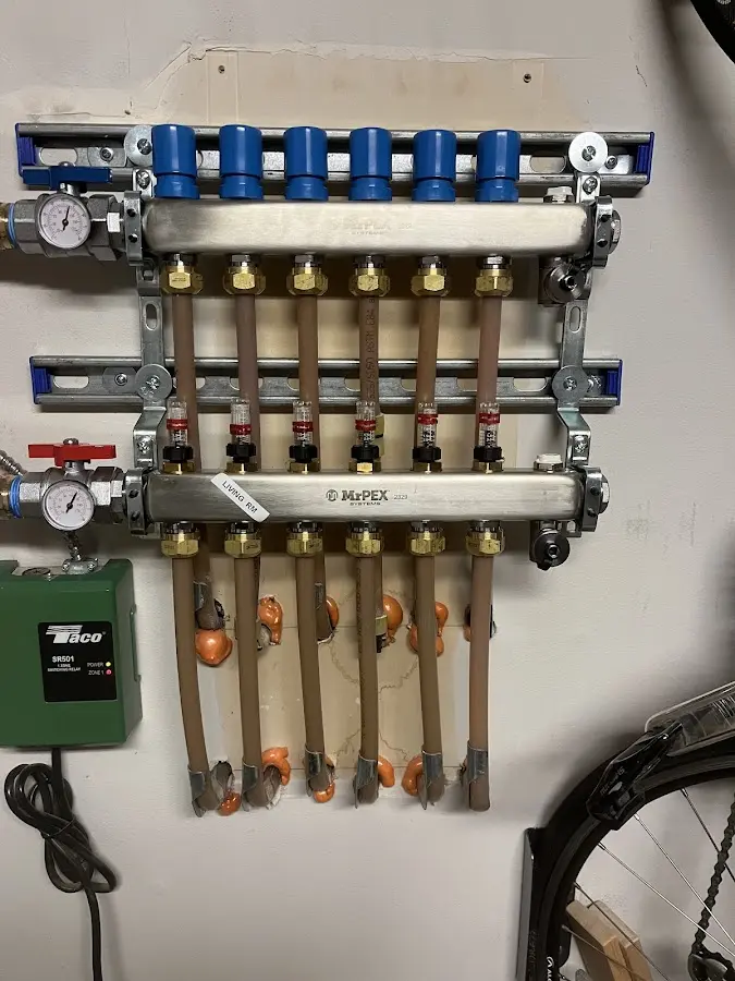 Plumber performing Gas Line Installation at a residential property in Denver